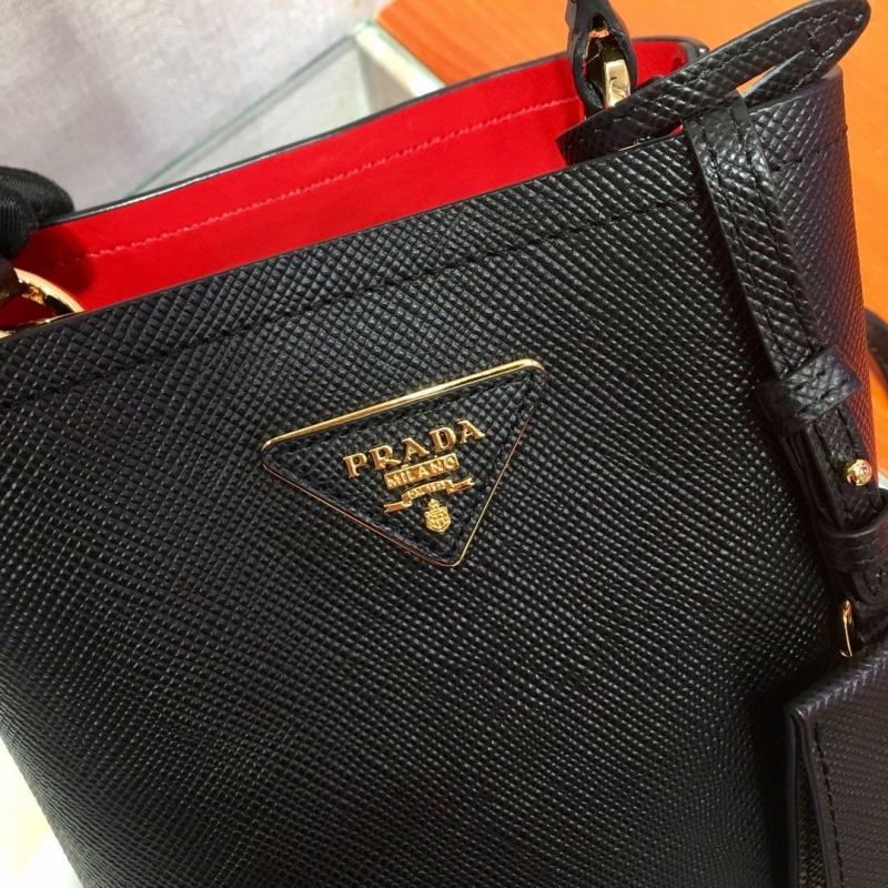 Pra*a top handle bags
